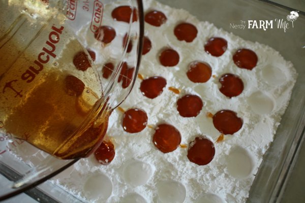 pour hot candy into powdered sugar molds