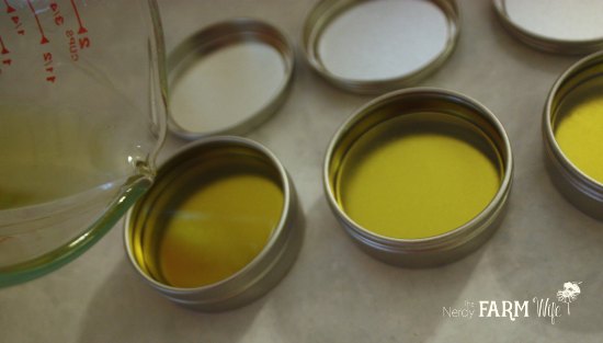 Pouring Violet Leaf Balm into Tins