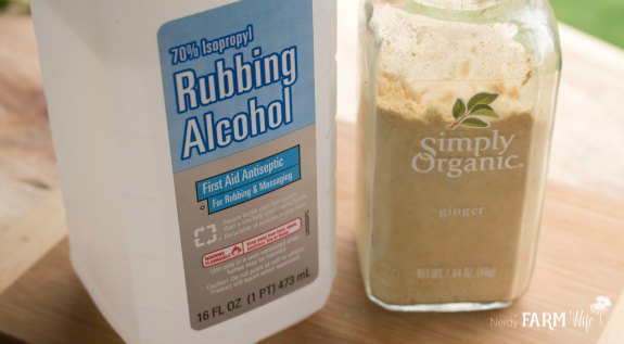 a bottle of rubbing alcohol and ginger powder