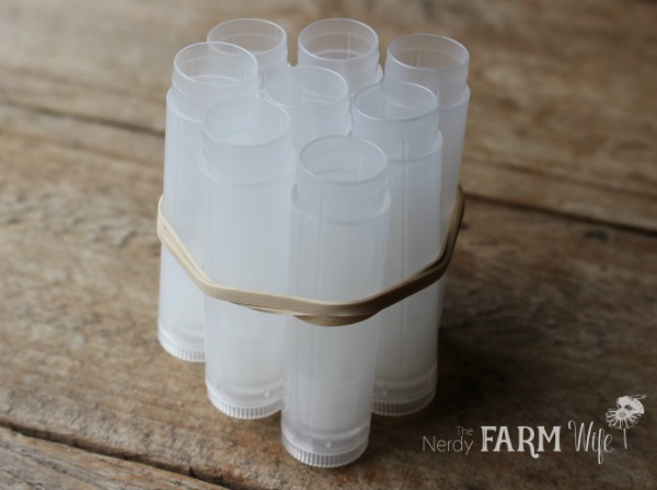 secure lip balm tubes with a rubber band for easier filling