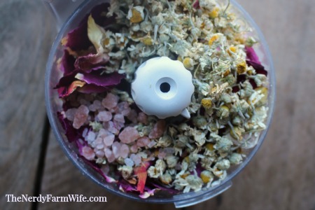 chamomile roses and salt being blended together