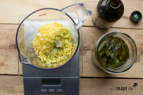 weigh ingredients for green gold lotion bars