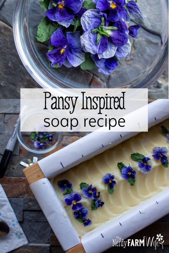 bowl of dried pansies and fresh soap in mold