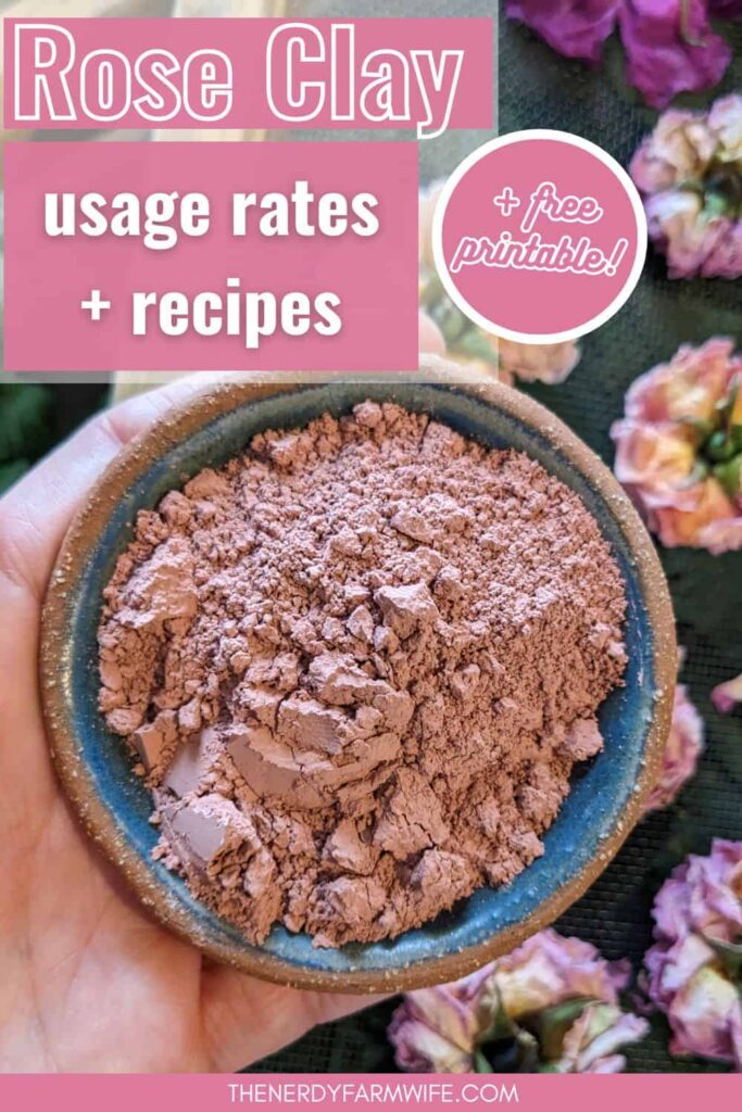 woman's hand holding a small bowl of rose kaolin clay
