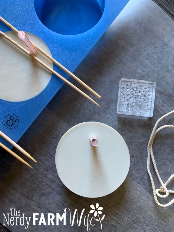 picture of soap with straw inserted in bar to make hole