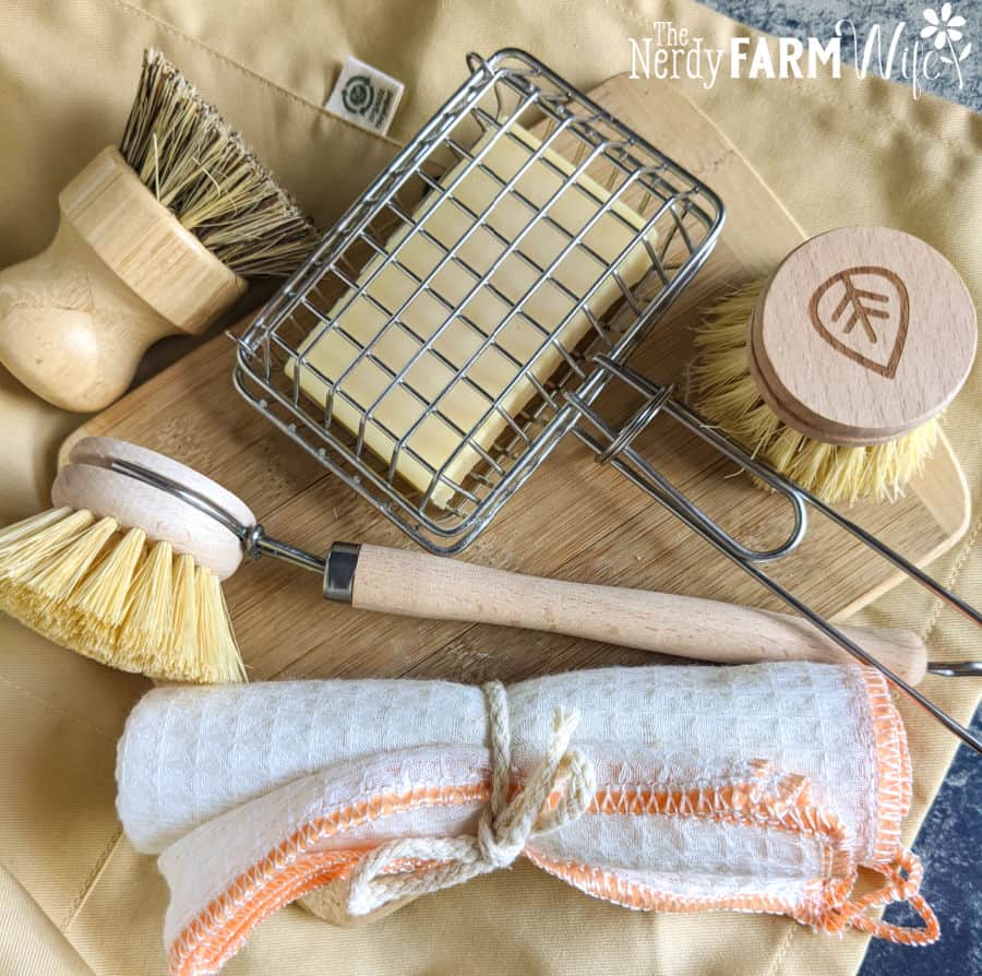 soap in soap shaker with natural brushes and cloths
