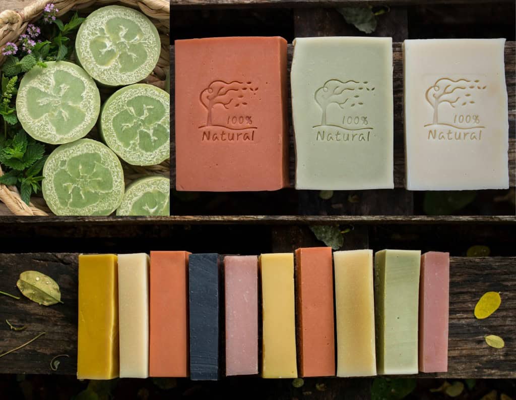naturally colored loofah soap plus bars of soaps in a row